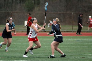 Barnstable High's Callie Rogorzenski (left) batles for draw control with Cape Cod Academy's Becca White in Monday's 13-7 win for the host Red Raiders. Sean Walsh/Capecod.com Sports Photos