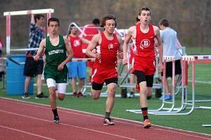 Barnstable High sophomore Cam Faszewski (right) leads the way en route to a first place finish in the two-mile race, while Barnstable senior Derek Silliman trails right behind. Kathleen Cugini photo for Capecod.com sports
