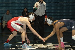 Sandwich High's Greg Zaw, ranked 4th in the state in the 120-lb. division. gets set to take on Barnstable's Casey Connor last night. Sean Walsh/capecod.com sports