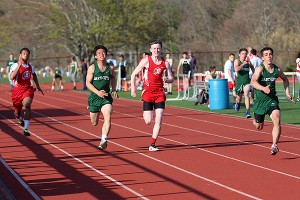 Barnstable High's Chris Fawcett (middle) blazes the lanes in the 