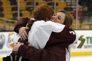 Falmouth Head Coach Erin Hunt gives a big hug to one of her stars, Kelly Ferreira at the TD Garden after capturing the Div. 2 State Championship in the spring. Sean Walsh/Capecod.com Sports