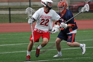 Barnstable High senior co-captain Bo Delaney wheels around the Walpole net with Rebel defender Dan Ryan hot on his trail. Sean Walsh/Capecod.com Sports Photos