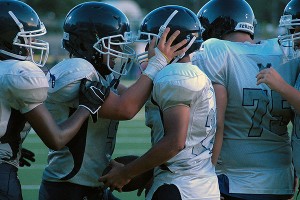 Monomoy's Devin Lopes is congratulated by teammate Garret Sherman after scoring a touchdown Friday night. Sean Walsh/Capecod.com Sports