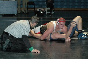 Barnstable High's Donnie Mach pins Sandwich High's Caleb White for the dual meet victory, 42-38, last night at Sandwich High School. Sean Walsh/capecod.com sports