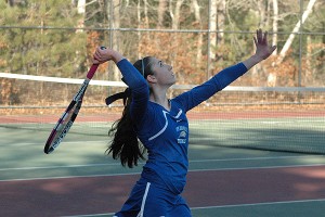 St. John Paul II's junior co-captain Emily Canzano suffered defeat but the Lady Lions held on to beat Sandwich, 3-2. Sean Walsh/Capecod.com Sports