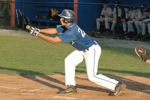 St. John Paul II's Jonny Warden provided relief and solid hitting to help the Lions roll to a 14-9 win over Bishop Stang. Sean Walsh/Capecod.com Sports