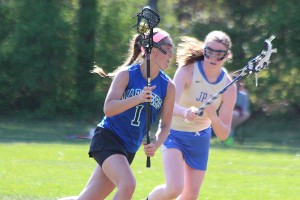 Falmouth Acaemy's Addy Hayman scored seven goals Monday against St. John Paul II as the Mariners clinched a perfect regular season at 14-0. Phil Garceau/Capecod.com Sports