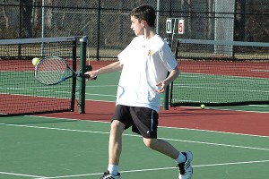 Nauset Regional High's Michael Sanborn returns the volley against Barnstable's Jackson Burbic Monday afternoon. Sean Walsh/Capecod.com Sports Photos