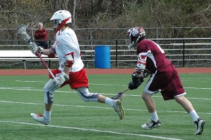 Barnstable High's Mike McDonough wheels and deals en route to a score in his team's 11-8 win over Falmouth. Sean Walsh/Capecod.com Sports Photos