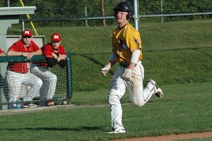 Nauset's Noah Grevelis attempts to score on Willy Boyd's triple in the first inning but got nailed at the plate. Later, Grevelis would scorethe game-winning run. Sean Walsh/Capecod.com Sports