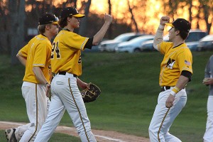 Nauset southpaw Chris Holcomb is congratulated after his 4-1 win over Sandwich Wednesday night at Eldredge Park. Phil Garceau/Capecod.com Sports