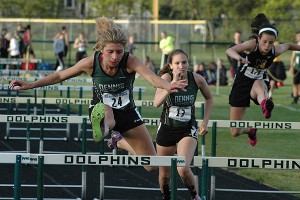 Dennis-Yarmouth's Olivia Miller captures the girls' 100m hurdles at yesterday's Atlantic Coast League championships. Sean Walsh/Capecod.com Sports