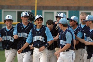 Sandwich High's Jake Golden is swarmed by teammates after his game-winning hit last night against Dennis-Yarmouth. Sean Walsh/Capecod.com Sports