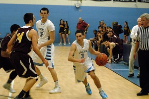 Sandwich High's Joey Downes scoed a game-high 23 points to help lead the Blue Knights to a 72-48 Division 2 South Sectional win last night against Sharon High. Hank O'Brien (15) had 18 points and 10 rebounds. Sean Walsh/Capecod.com Sports