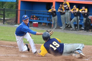 St. John Paul II's Blake Waters tags out Marian High School's Zach MacGregor who was subsequently ejected from the game after arguing the call. Phil Garceau/Capecod.com Sports
