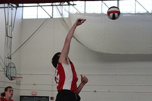 Barnstable High School junior co-captain Scott Sawyer delivers one of his 14 kills on the night in the Red Raiders' 3-0 win over Durfee. Phil Garceau Photo for Capecod.com Sports