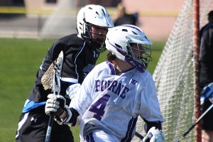 Bourne High School's Shaun Girard wheels and deals behind the Fairhaven goal in overtime. The Canalmen prevailed, 9-8. Phil Garceau/Capecod.com Sports Photo