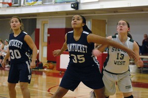 Nantucket High School's Jadelen Harold (35) boxes out Sturgis West's Cat Mahoney in the Whalers' 66-27 win yesterday afternoon. Sean Walsh/capecod.com sports