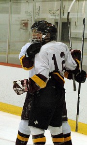 Cape Tech/Cape Cod Academy's Zach Vaughan is congratulated for his first period goal yesterday at the Gallo Ice Arena, but that was all the Cruasders could muster in a 4-1 tourney loss to Attleboro. Sean Walsh/Capecod.com Sports