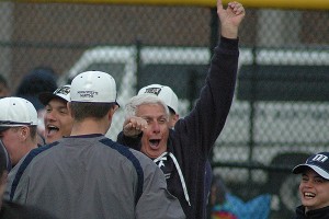 Massachusetts Maritime Academy head baseball coach Bob Corradi celebrates with his grandson Sean after his Buccaneers won their second straight in dramatic walk-off fashion. Sean Walsh/Capecod.com Sports Photos