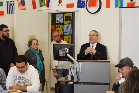 COURTESY OF CAPE COD COMMUNITY COLLEGE: Adult Education Center Director Jhon Valencia speaks during an open house of the downtown Hyannis location. (Photo by Christine Pauk)