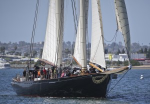 America, a 139 foot replica of the original America's Cup yacht, cruises with sightseers in San Diego Bay Friday, April 1, 2016, in San Diego. The ship's captain, Troy Sears, plans to leave San Diego on April 12 for a tour that will take him to yacht clubs and races up and down the East Coast and to the Caribbean. (AP Photo/Lenny Ignelzi)