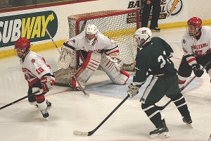 Barnstable High senior goalie Jake Kacyzinski protects his crease in last night's 3-1 win over the Dennis-Yarmouth Dolphins. Sean Walsh/CCBM Sports