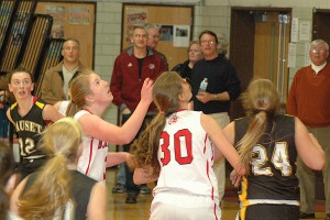 Barnstable's Maggie Murray and Hannah Kerr battle Nauset's Christine Burns and CLaire Wardlaw beneath the basket in last night's 50-23 win for the hosts in Hyannis. Sean Walsh/www.capecod.com sports