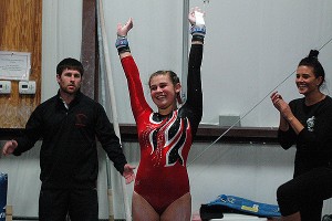 Barnstable High School's Tali Twomey is all smiles after nailing a 9.25 on the uneven bars Monday night. Twomey has a banner day Tuesday at Carver.. Sean Walsh/capecod.com sports Click photo to view galleries and order prints