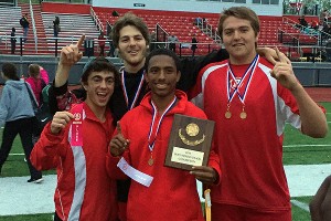 Barnstable High co-captains Nathan Ryan, Ray Todoroff, Malique Dickerson-Pells and Nick Johnson hold up their OCL Championship Meet trophy after yesterday's big win. The Red Raiders remain unbeaten at 7-0. Photo courtesy of Mike Merrill