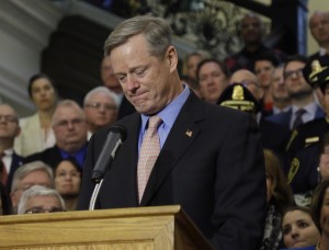 Mass. Gov. Charlie Baker becomes emotional as he speaks after signing sweeping legislation aimed at reversing a deadly opioid addiction crisis, during a signing ceremony at the Statehouse, Monday, March 14, 2016, in Boston. (AP Photo/Elise Amendola)
