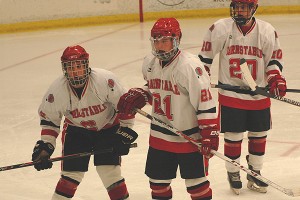 Barnstable senior captain Donnie Brodd (21) made the game-winning pass in the third period at Marshfield Saturday night, while Kevin Craig (20) scored the game-tying goal to make it 2-2. Also shown here is Steven Megnia (6). Sean Walsh/CCBM Sports