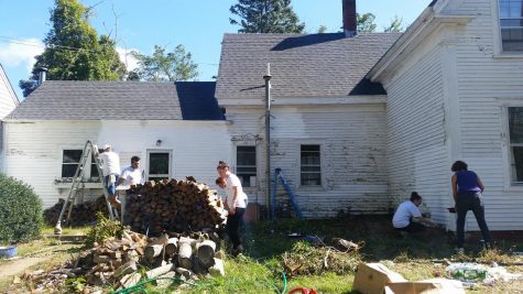 CCB MEDIA PHOTO: Volunteers work on a house along Route 6A in Brewster Saturday during the annual Big Fix