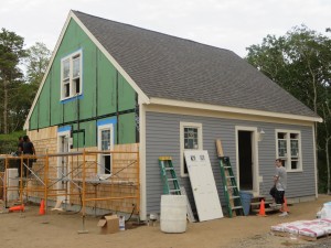 CCB MEDIA PHOTO Crews continue to work on the Blitz Build in Harwich. The house, which began being constructed on Monday morning will be completed by the end of the week.