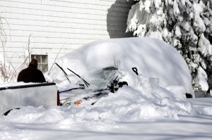 Cars became buried in snow drifts during the storm.