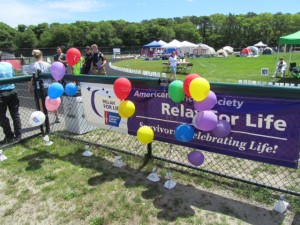 BOB SURRETTE PHOTO The 2014 event was both a celebration of life with somber moments of reflection.  There was a collective affirmation to continue the efforts to find a cure.