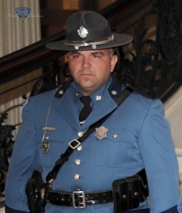 This image provided by the Massachusetts State Police shows Thomas Clardy. Authorities announced Wednesday, March 16, 2016, that Clardy, a Massachusetts State Police trooper was injured in a car crash on the Massachusetts Turnpike, has died. (Massachusetts State Police via AP) MANDATORY CREDIT
