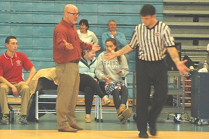 Barnstable High School head coach Chuck Kipnes seeks but gets no relief from one of the game officials in his team's 89-75 opening loss Friday night at Sandwich High. Sean Walsh/CCBM Sports