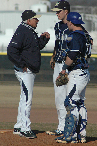 Bob Corradi, seen here last March at Johnson & Wales with Maritime pitcher Kevin Kwedor and catcher Matt Pelletier, will be honored by the CBUA umpires association. Photo by Sean Walsh/CCB Media Sports