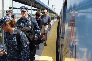 CCB MEDIA PHOTO: Veterans arrive on the Cape Flyer in Hyannis Sunday