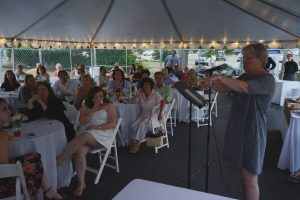 Founder and Executive Director of Transitions Centers Christine Spaulding speaks at a Friday fundraiser which commemorated the organization's move to a new building