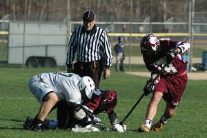 Dennis-Yarmouth's Kyle DiFrancesco battles for the ball at midfield. Sean Walsh/Capecod.com Sports Photos