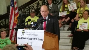 CCB MEDIA PHOTO Cape and Islands State Senator Dan Wolf (D-Harwich) speaks at a rally in Boston Thursday, calling for an immediate closure of the Pilgrim Nuclear Power Plant in Plymouth