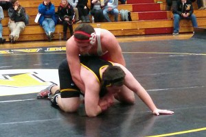 Barnstable High's Donnie Mach gets leverage on Nauset's Jake Colson in last night's 45-30 Red Raider win in Eastham. Photo courtesy of Dan Connor