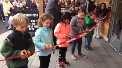 COURTESY OF THE EASTHAM PUBLIC LIBRARY: Elementary school students cut the ribbon for the new Eastham Public Library Tuesday.