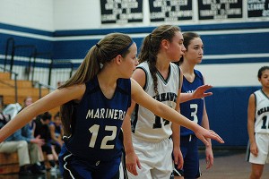 Falmouth Academy's Eliza Van Voorhis prepares to box out Cape Cod Academy's Morgan Farber in Monday night's 59-22 Mariners' victory. Sean Walsh/capecod.com sports