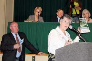 CCB MEDIA PHOTO Virginia Valiela, co-chair of Falmouth's Water Quality Management Committee, urges Town Meeting members not to approve a petitioner's article by Mark Finneran, standing at left.