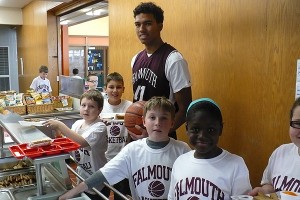 Falmouth High School basketball player Leo DeOliveira shares breakfast with kids at the Morse Pond Elementary School - some of his pen pals. Photo courtesy of Joe Santos