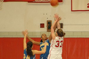 Barnstable's Megan Dombrowski had 8 rebounds but it was not enough to stave off the rebounding prowess of Sandwich's Carly Whittle and Kay Stanton as the Blue Knights beat their guests, 38-26. Sean Walsh/www.capecod.com sports
