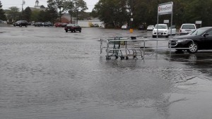 CCB MEDIA PHOTO A parking lot in Hyannis floods on Wednesday morning as heavy rains hit the area